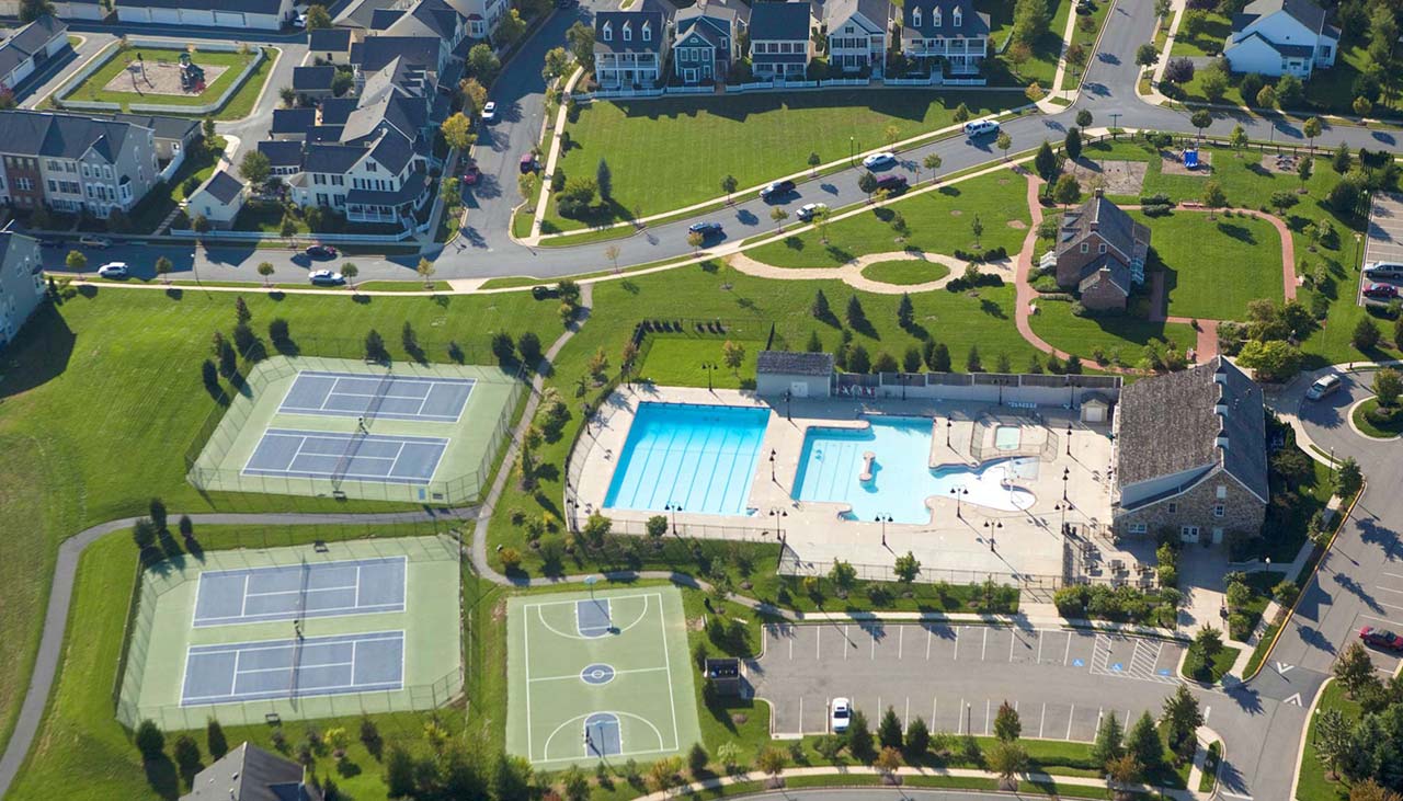 Aerial view of pool and tennis court